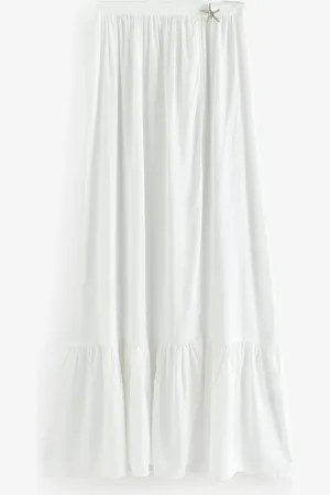 Guess Lange witte wikkelrok voor het strandmedium
