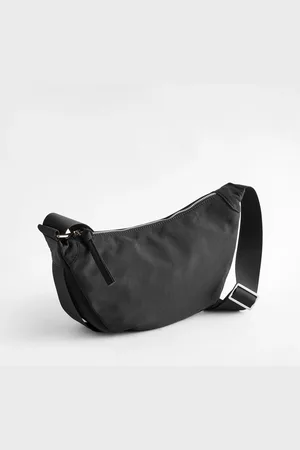 Next Crossbodytas met slingbandEén