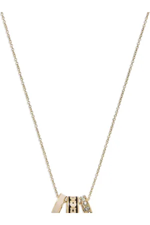 Coach Gold Tone Signature Rondelle Pendant NecklaceEén