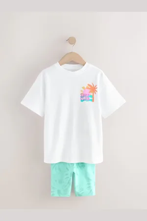 Next Set van oversized T-shirt en fietsshort top & short (3-16jaar)104110cm