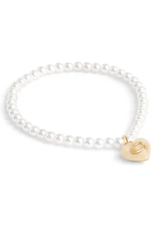 Coach Gold Tone Signature Heart Charm Pearl BraceletEén