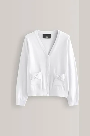 Next Schoolvest met zakken van katoenrijk materiaal (3-16 jr)134140cm