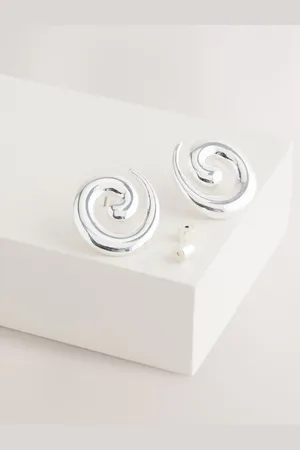 Next Oorbellen met studseen