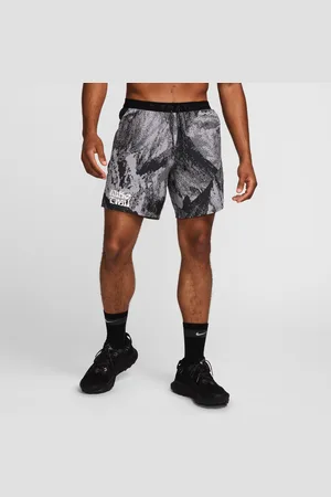 Nike Trail Stride Dri-FIT hardloopshorts met binnenbroekje voor heren (18 cm)