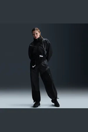 Nike Sportswear geweven ruimvallende damesbroek met halfhoge taille en open zoom