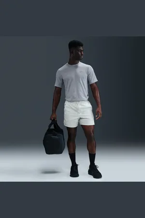 Nike Unlimited multifunctionele niet-gevoerde herenshorts van seersucker met Dri-FIT (13 cm)
