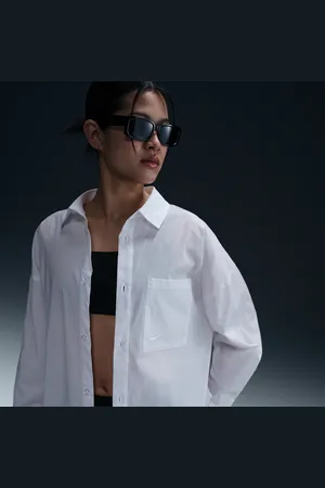 Nike Sportswear Chill Poplin ruimvallende damestop met lange mouwen en knoopsluiting