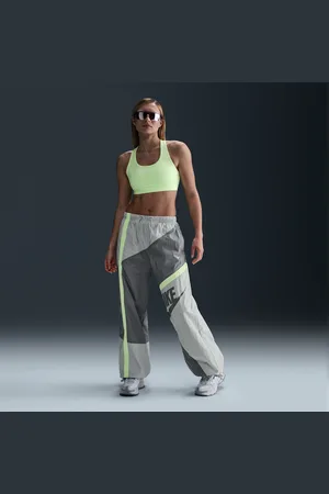Nike Sportswear geweven ruimvallende damesbroek met halfhoge taille en open zoom