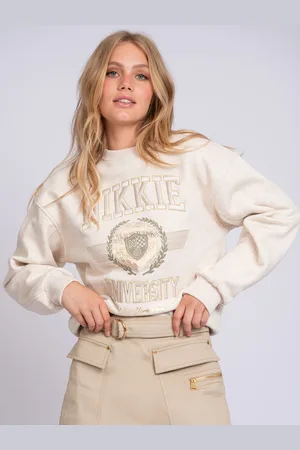 NIKKIE. University Gold Sweater