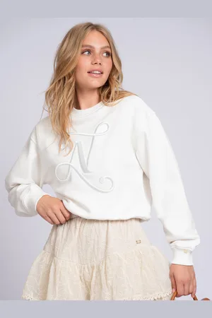 NIKKIE. Swirl Sweater