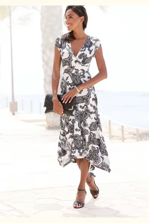 Lascana Zomerjurk met puntzoom en strik in de taille, strandjurk, paisley-patroon