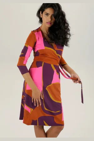 Aniston Jerseyjurk met verleidelijk decolleté en trendy print