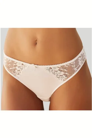Lascana Tanga van gebloemd kant in stijlvol transparante look