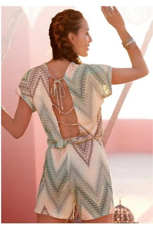 Lascana Korte jumpsuit met diepe ruguitsnijding en alloverprint, zomerse jumpsuit