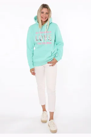 Zwillingsherz Hoodie "Love is all you need ZH" met "love"-inscriptie en paillettenhartjes op de rug