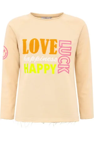 Zwillingsherz Sweater "Love Luck Happy" met used-look randen en vrolijke borduursel