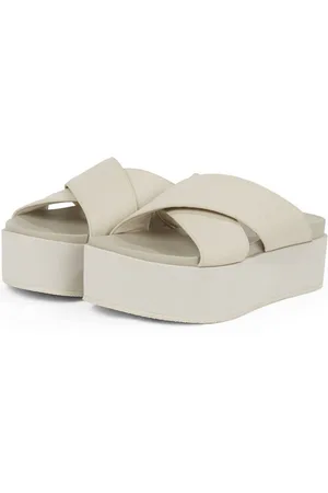 Calvin Klein Slippers FLATFORM CROSS MG UC , plateau, zomerschoen, pantoffels met kruisverband