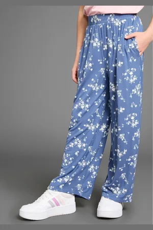 Kidsworld Comfortbroek Viskose broek met bloemendruk Trendige broek met bloemenmotief