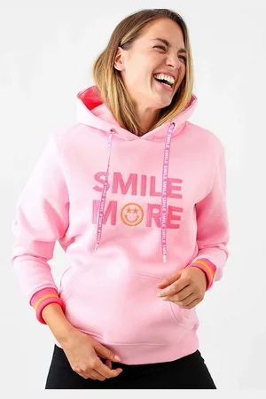 Zwillingsherz Hoodie "Smile More" met vrolijke borduursel en neonboord