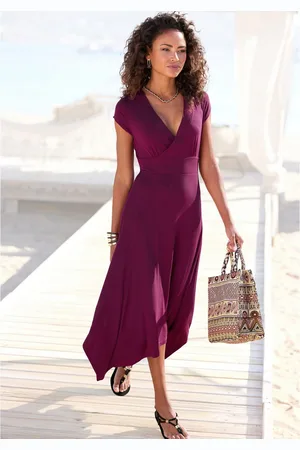 beachtime Zomerjurk met puntzoom en strik, jersey jurk, asymmetrisch rokdeel