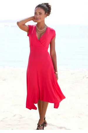 beachtime Zomerjurk met puntzoom en strik, jersey jurk, asymmetrisch rokdeel