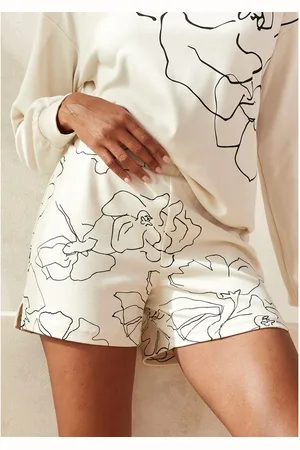 Lascana Sweatshort -lounge shorts met allover bloemetjesprint, loungewear