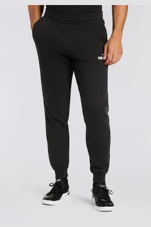 PUMA Trainingsbroek ESS CAMO SWEATPANTS FL CL