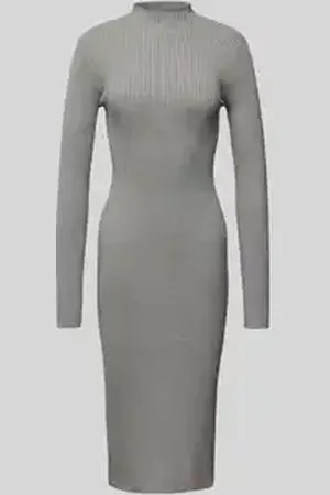 EDITED the label Gebreide jurk met opstaande kraag, model 