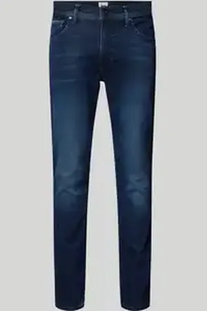 Brax Tapered fit jeans in 5-pocketmodel, model 