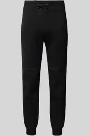 Review Tapered fit sweatpants met labelprint