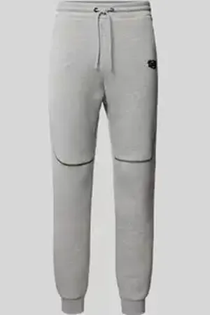 Review Tapered fit sweatpants met labelprint