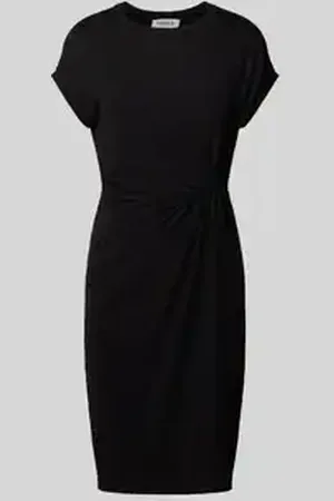 EDITED the label Knielange jerseyjurk met knoopdetail, model 