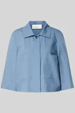 More Korte blouse met steekzakken