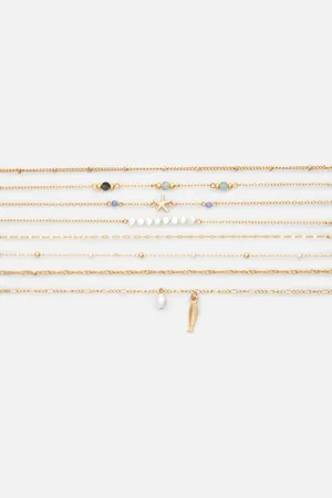 Primark Armbanden met imitatieparels en bedels, set van 8
