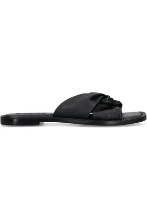 Sacha Zwarte leren slippers met knoop detail