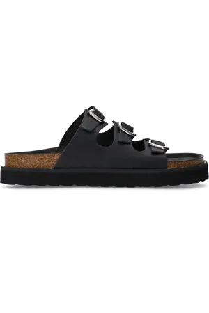 Sacha Zwarte leren slippers met buckles