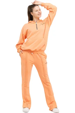 Tom Barron Dames trainingspak met kwart rits en logo in oversize