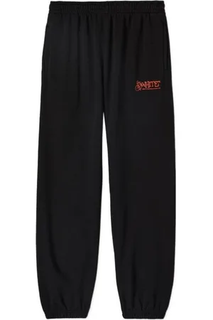 OFF-WHITE Gebroken witte graffiti Arrow Crew Design slanke zwarte joggingbroek met manchetten