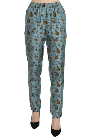 Dolce & Gabbana Taps toelopende broek met muziekinstrumentenprint