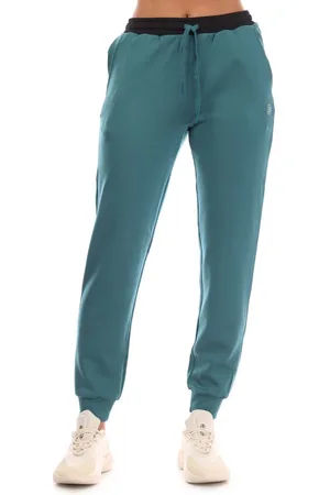 Skins Dames Series-3 Warm Up Broek in Teal