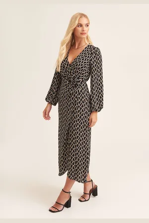 Gini London Zwarte midi-jurk met ringdetail en geoprint