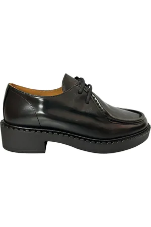 Belang Zwarte damesmocassin