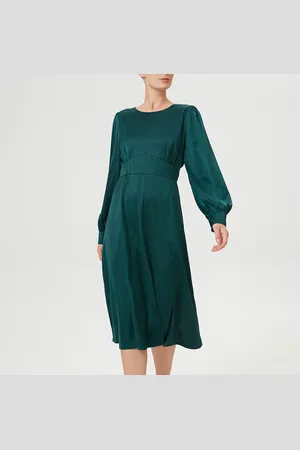 S.J. Aangepaste en wijd uitlopende vloeibare blouse -jurk
