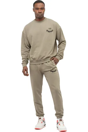 Tom Barron Heren Trainingspak Happy met oversized borduursel