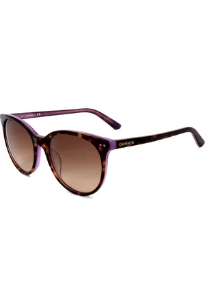 Calvin Klein Lunettes de soleil CK18509S 238 tortoise milky purple brown