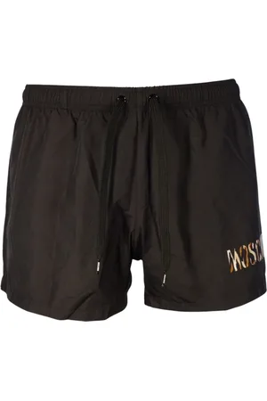 Moschino Kleine zwarte korte zwemshort met luipaardprint