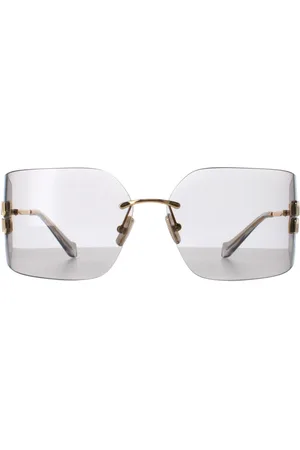 Miu Miu MU54YS 5AK30B gouden lichtgrijze zonnebril
