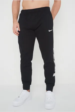 Nike Heren Herhaal Taping Logo Fleece Cuffed Joggers in