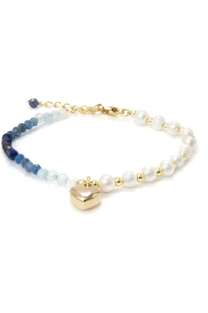 Luxenter Blauwe Kristal Armband afgewerkt in 18K geel goud