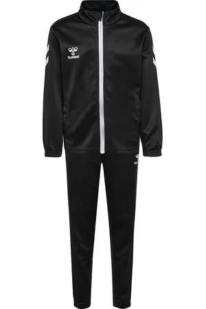 Hummel Kinder trainingspak Logo
